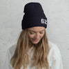Women wearing navy blue beanie hat with number 62